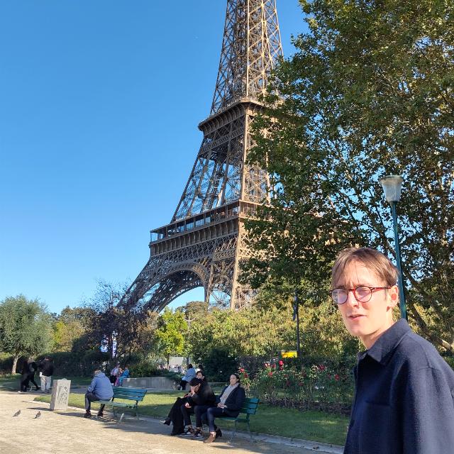 Joseph Tulloch in front of the Eiffel Tower